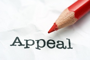 Appeal Paperwork With a Red Pencil