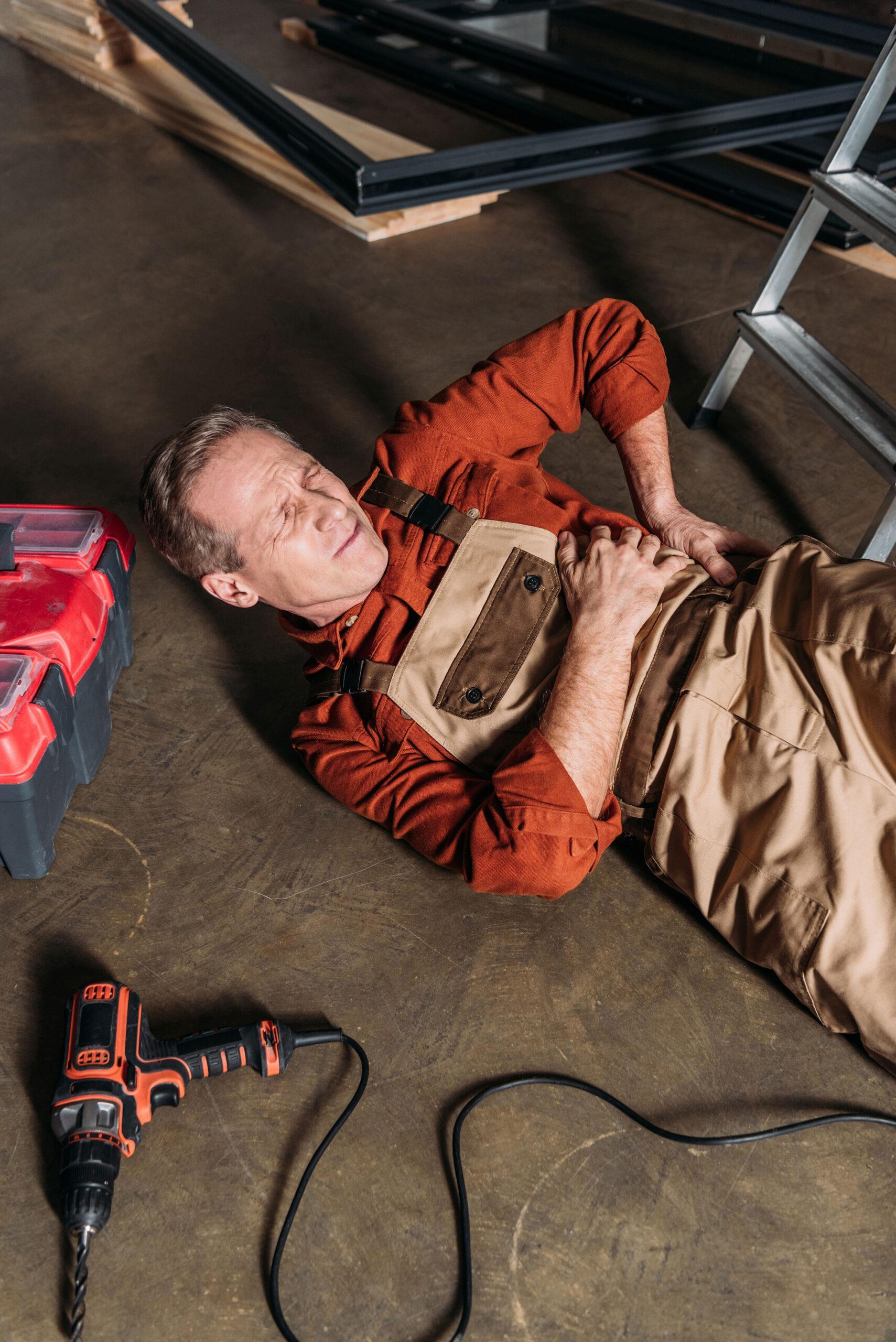 middle-aged-repairman-lying-on-floor-near-ladder-a-2026-01-06-00-01-25-utc-scaled